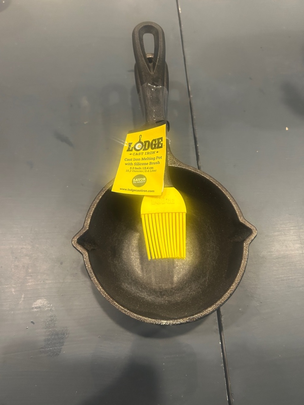 Lodge Cast Iron Skillet with Yellow Silicone Basting Brush